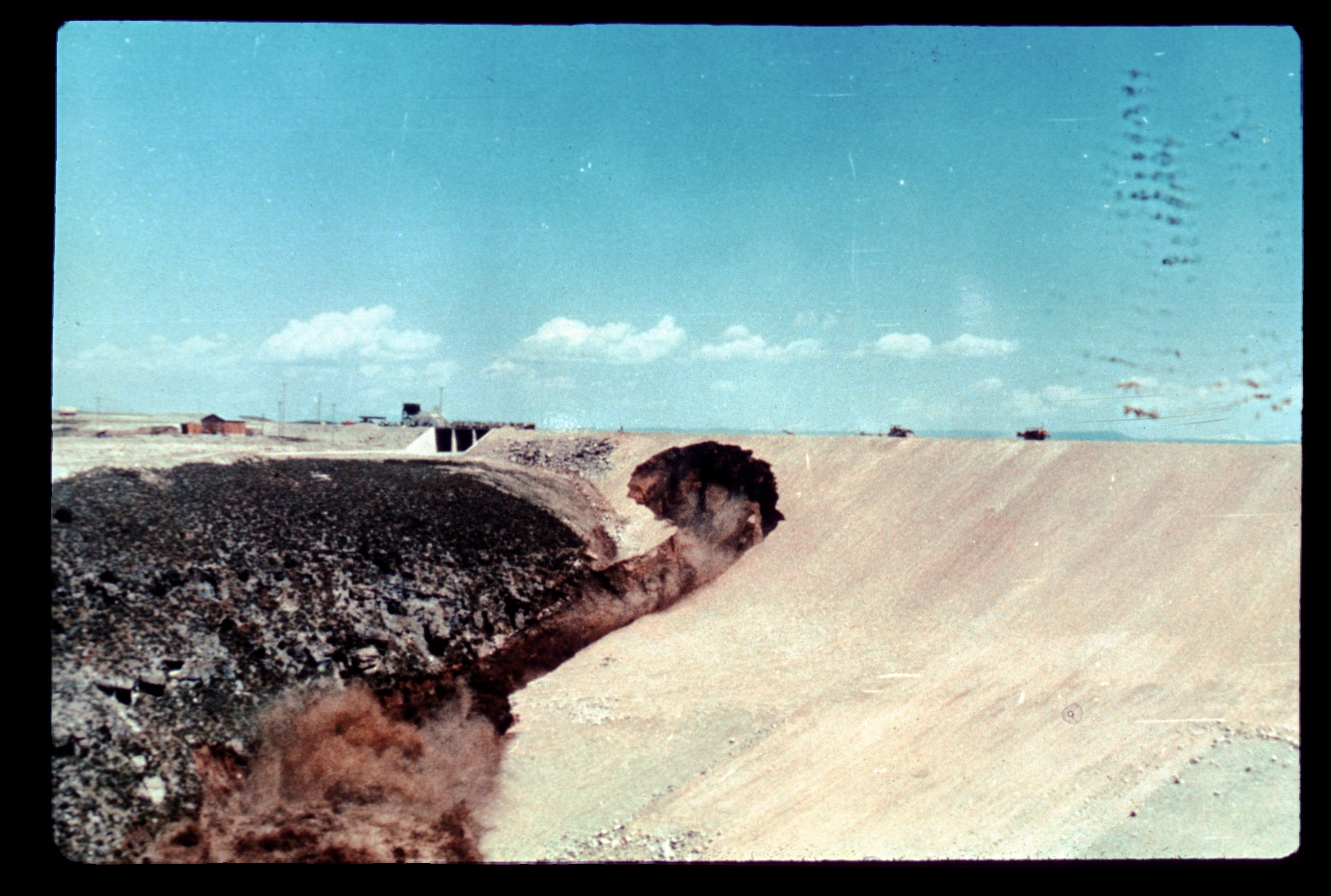Aerial image of Teton Dam failure seepage.